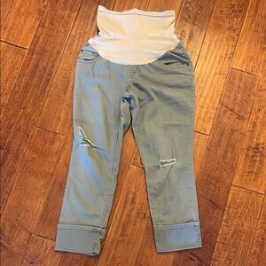 Motherhood Maternity light green cuffed pants. Styled with rips on front legs.